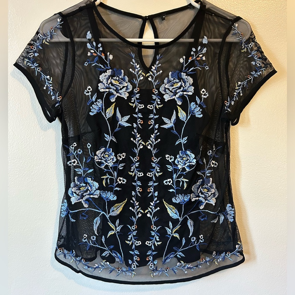 Black mesh top with blue floral pattern. Size Small